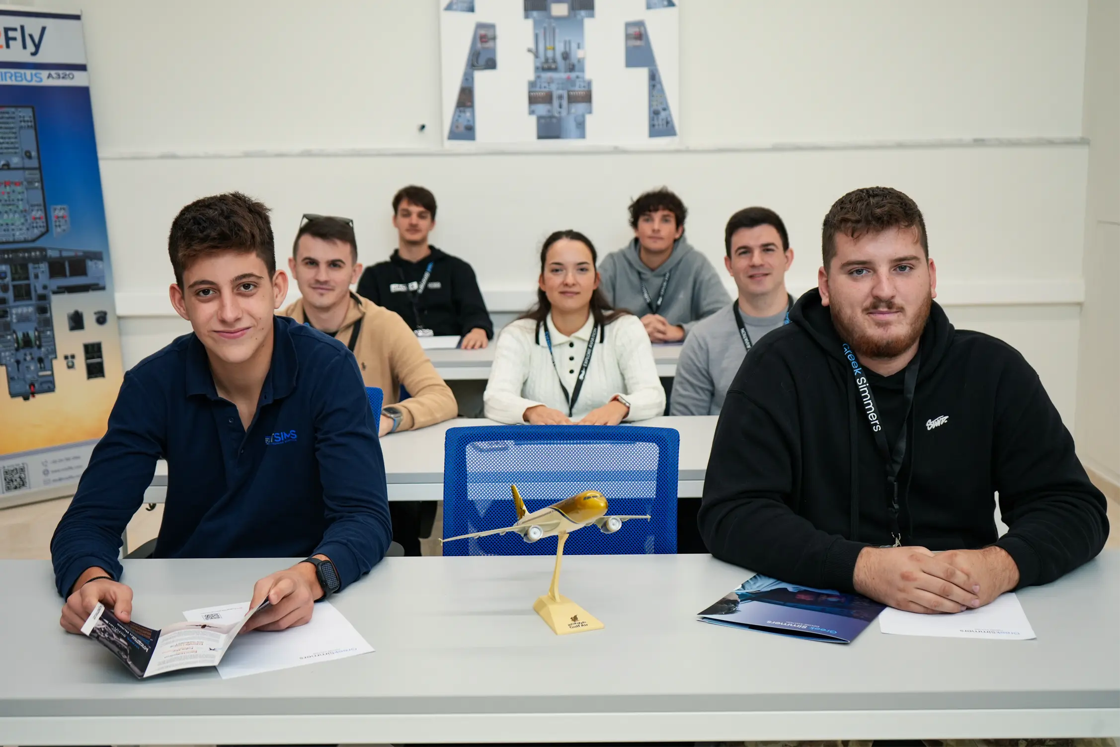 Simulator cockpit with pilot and instructor