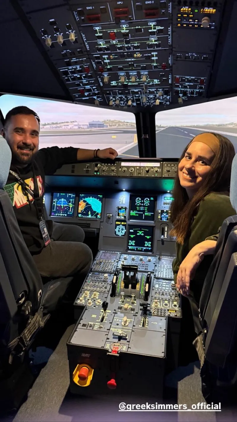 Happy couple in the cockpit after their flight experience