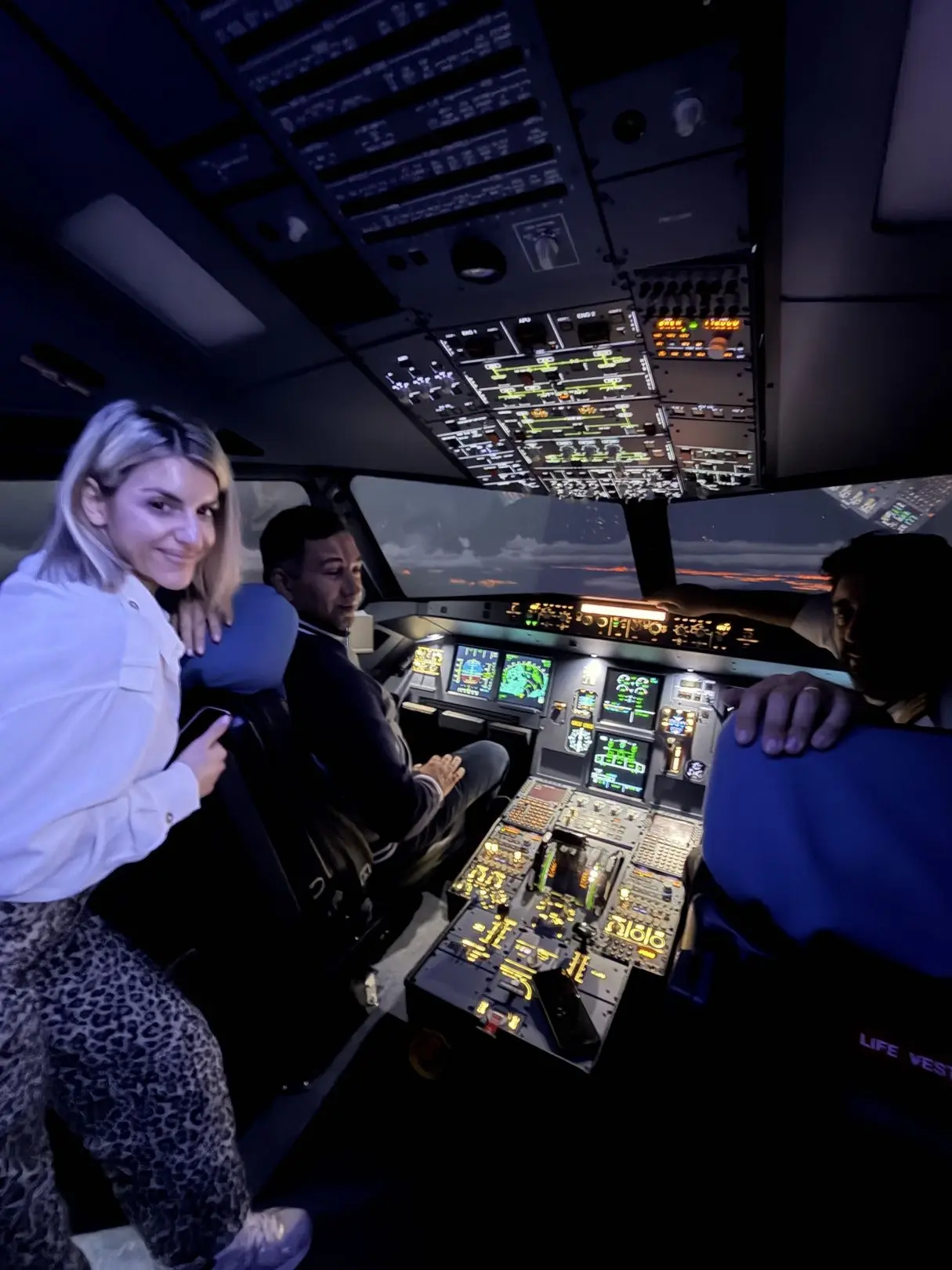 GreekSimmers staff member in the lobby welcoming visitors